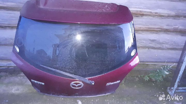 Задняя дверь mazda демио
