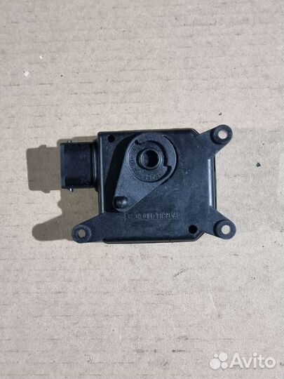 Моторчик заслонки отопителя Opel Astra G