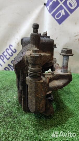 Суппорт передний левый Chevrolet Cruze хэтчбек 1.8