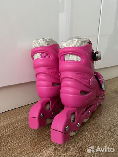 Роликовые коньки