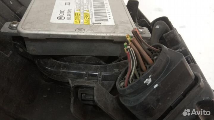 Фара левая Volkswagen Touareg