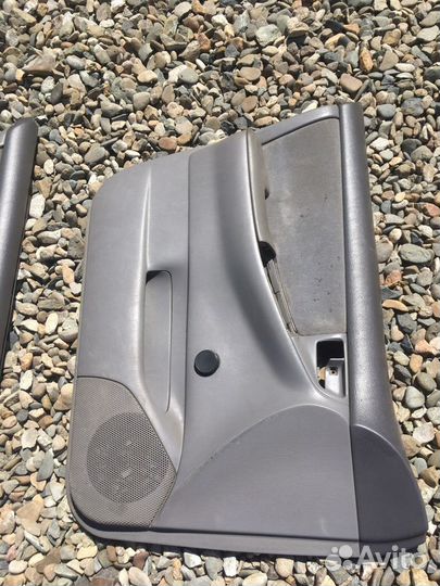 Обшивка двери Toyota Corolla 9 Е120 Е130