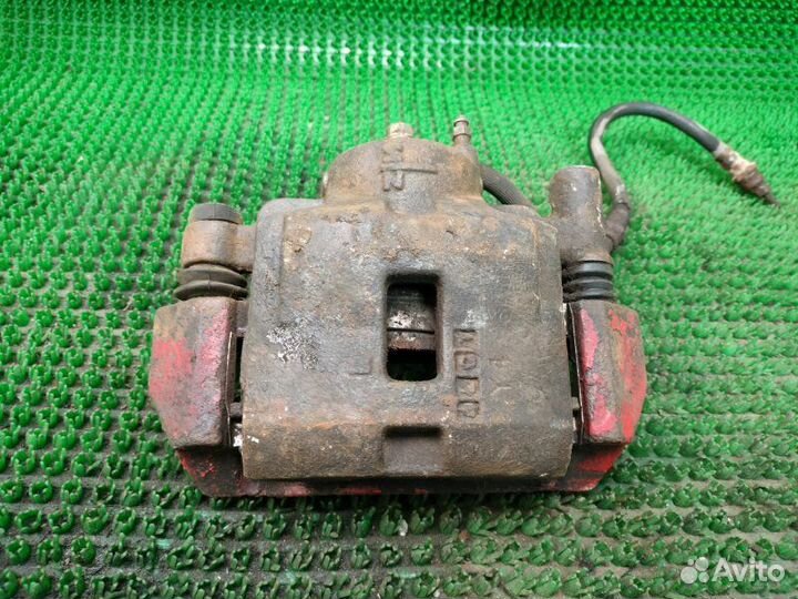 Суппорт передний левый Mazda 626 GE FS 1995