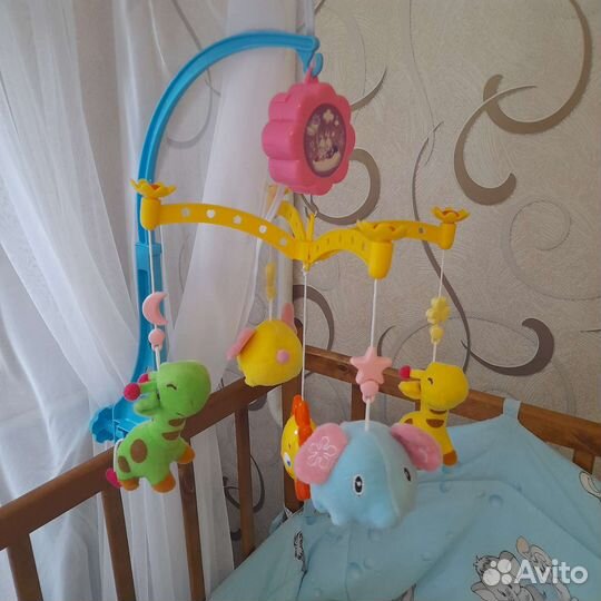 Музыкальная карусель на кроватку