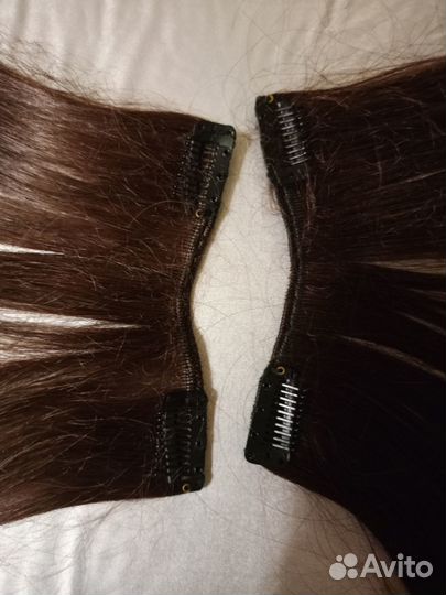 Волосы не натуральные, на заколках 50 см