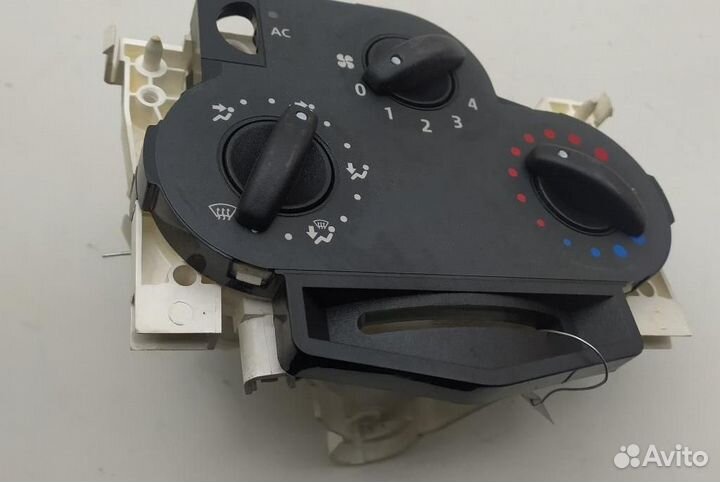 Переключатель отопителя Renault Logan