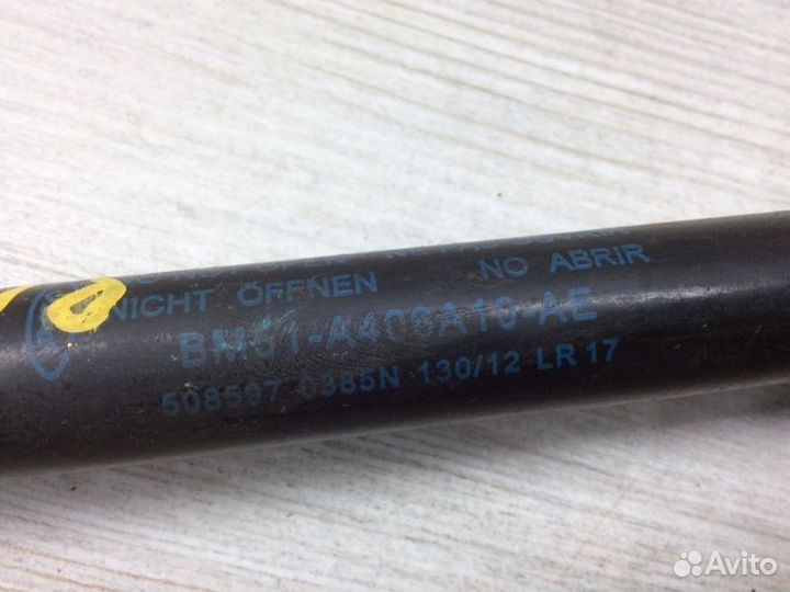 Амортизатор двери багажника левый Ford Focus 3 Х/Б