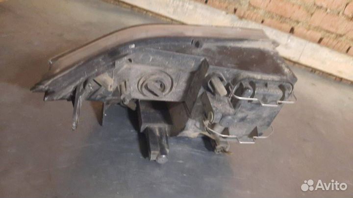 Фара левая Ford Transit 7 2008