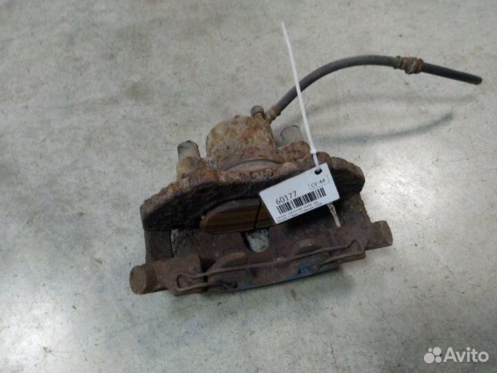 Суппорт тормозной передний левый Mazda 3 седан 2.0