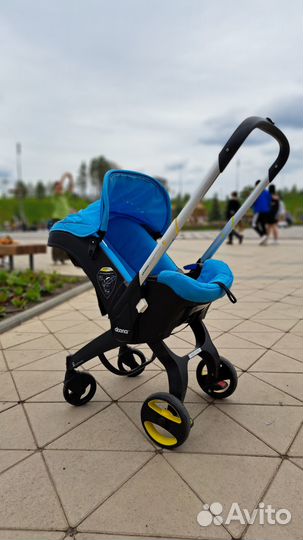 Коляска автокресло doona с базой isofix