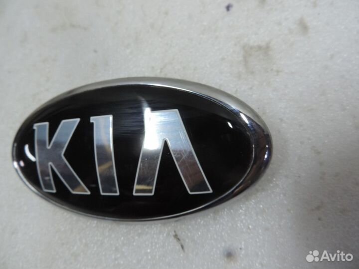 Эмблема переднего бампера Kia Sportage 2016