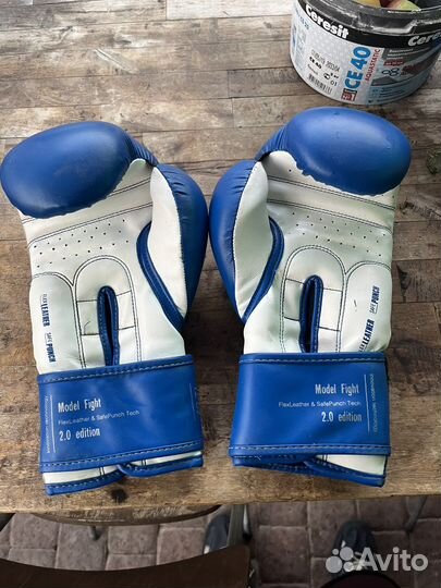 Боксерские перчатки 12 oz clinch