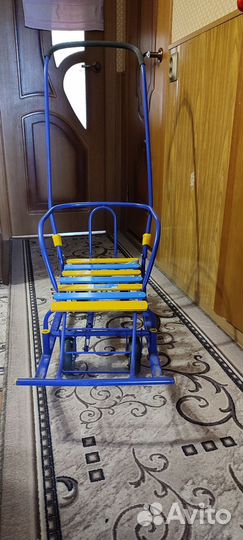 Детские санки с выдвижными колесами