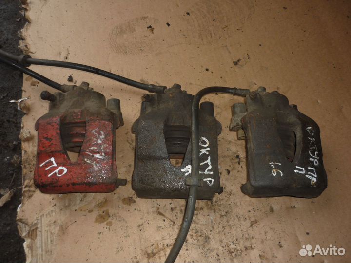 Суппорт передний правый Шкода Октавия Тур