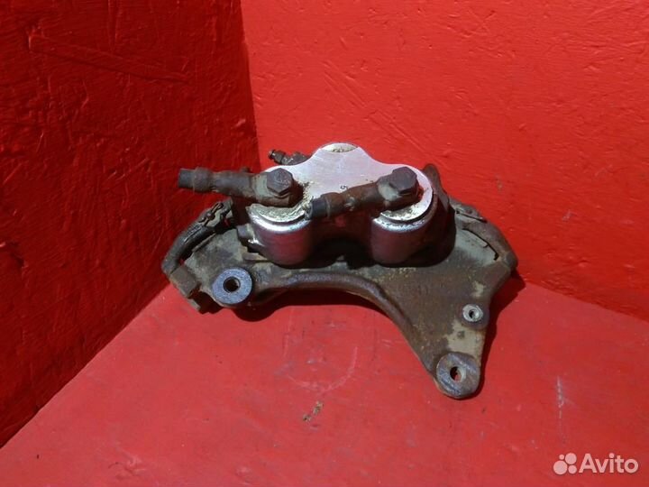 Суппорт левый нива 21213 21214 Ваз 2121 хор.сост