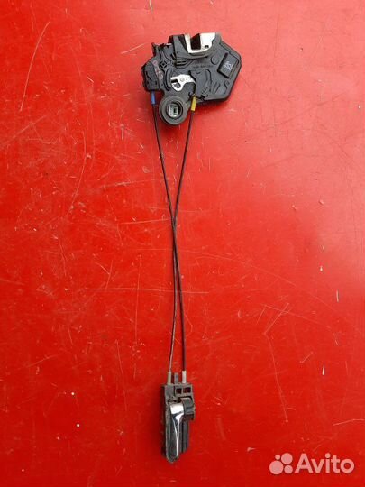 Замок двери задний левый Toyota Corolla E120