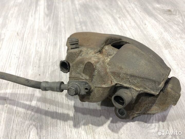 Суппорт тормозной передний правый Volkswagen Polo