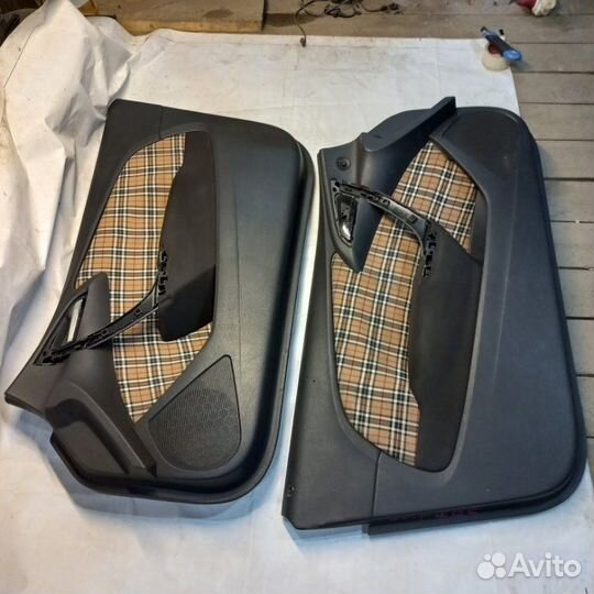 Обшивка двери Opel Astra J GTC