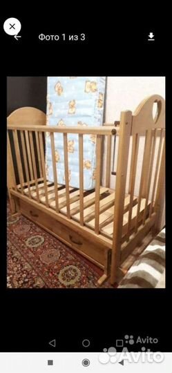 Детская кроватка с маятником и ящиком