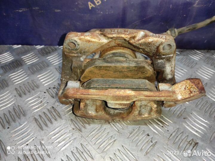 Суппорт тормозной передний правый Renault Scenic 1