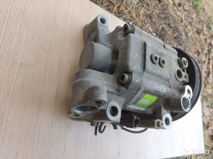 Компрессор кондиционера Subaru 73110AE050