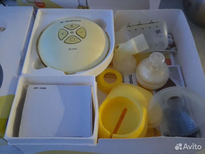 Молокоотсос medela swing