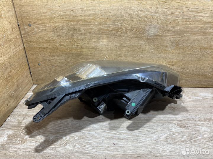 Фара передняя левая Opel Astra H 142293