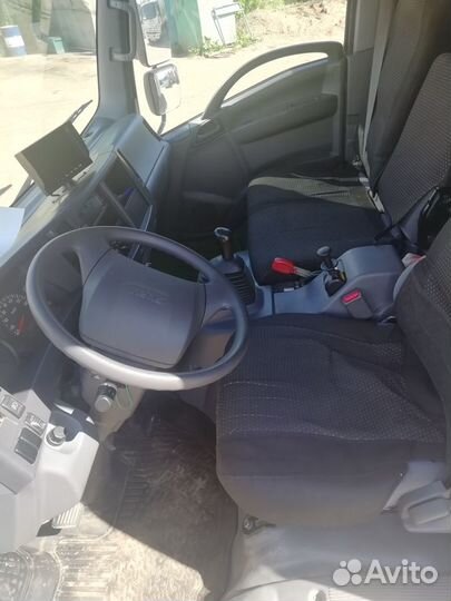 Мусоровоз на шасси Isuzu Elf 9.5