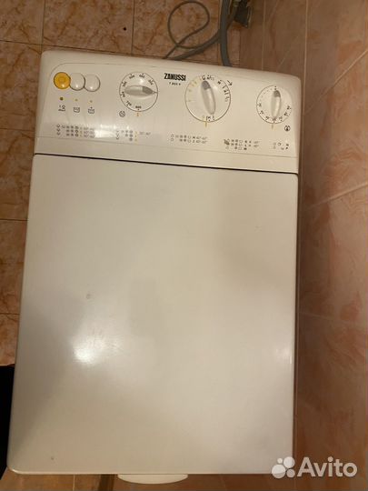 Стиральная машинка с вертикальной загрузкой