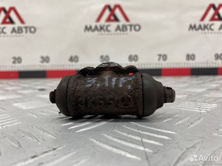 Б/У тормозной цилиндр задний правый Mazda Demio 1