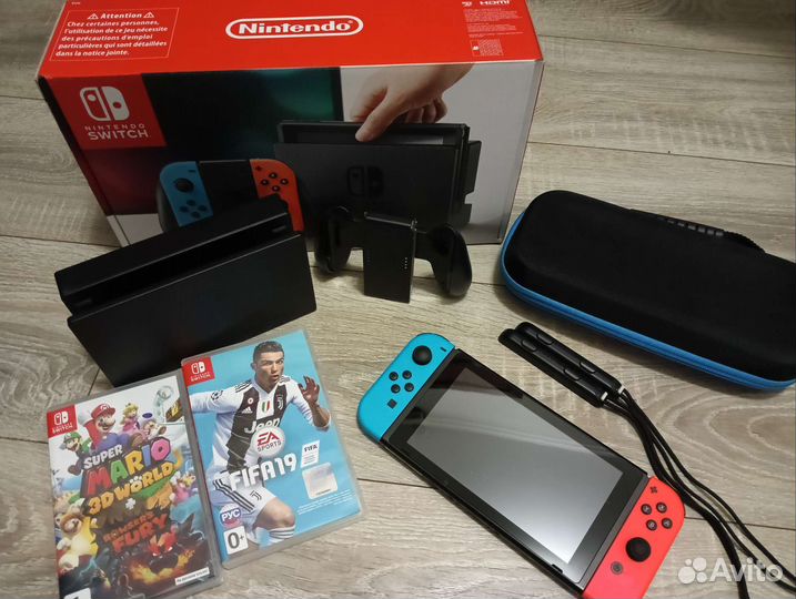 Игровая приставка Nintendo Switch + картриджи