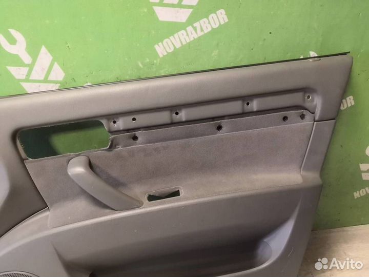 Обшивка двери передней правой Шевроле Лачетти