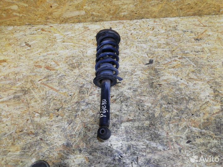 Стойка амортизатора передняя левая Mitsubishi