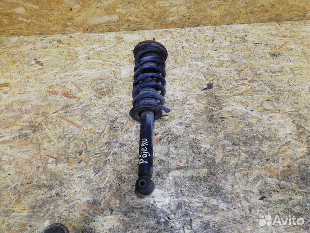 Стойка амортизатора передняя левая Mitsubishi