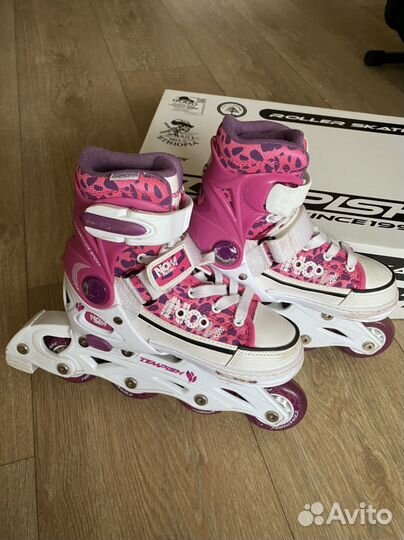 Роликовые коньки