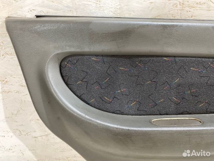 Обшивка боковой двери задняя левая Kia Spectra