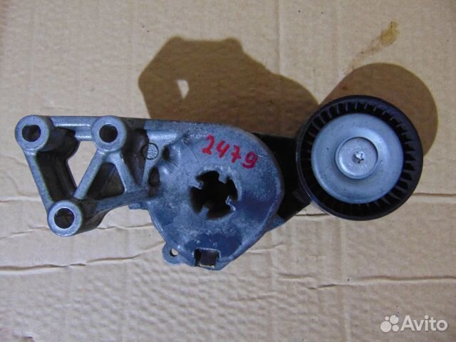 Ролик-натяжитель ручейкового ремня Volkswagen