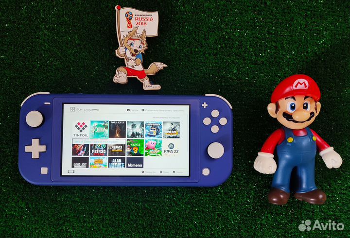 Прошитый Nintendo Switch Lite и много игр в Марио