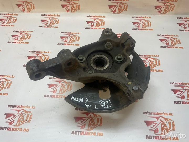 Кулак поворотный передний левый Mazda 3 BM седан