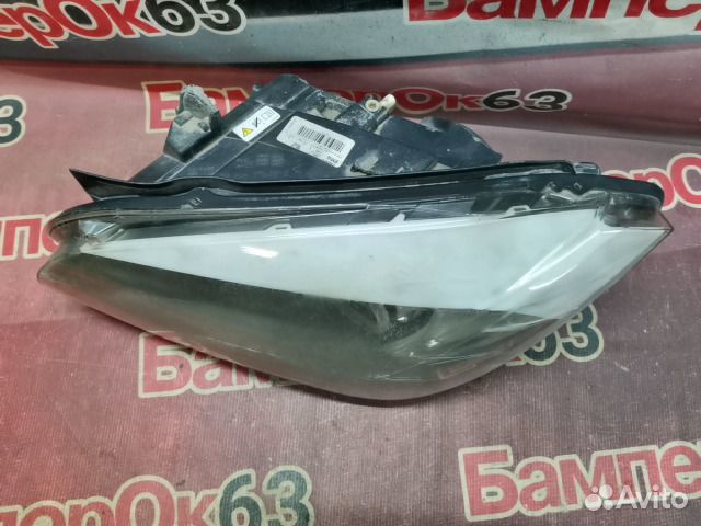 Фара левая BMW X1