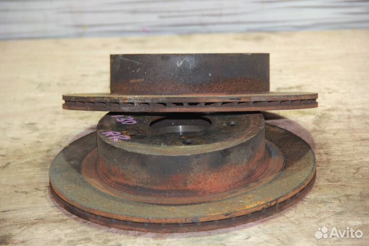 Тормозной диск зад c Nissan Primera TP12 QR20DE