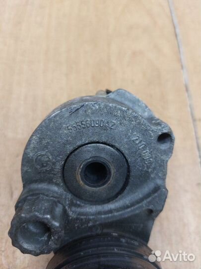 Натяжной ролик приводного ремня Opel Astra H