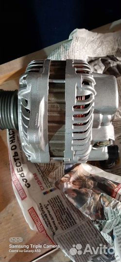 Генератор на mitsubishi lancer 10