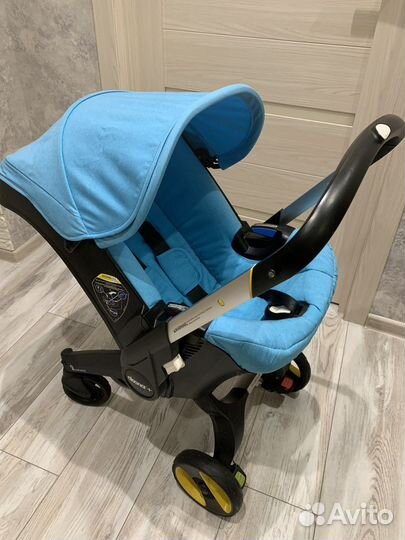 Коляска автокресло doona с базой isofix