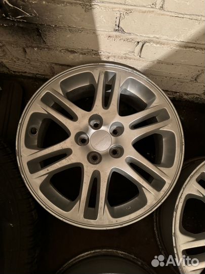 Продам оригинальные литые диски Subaru R16