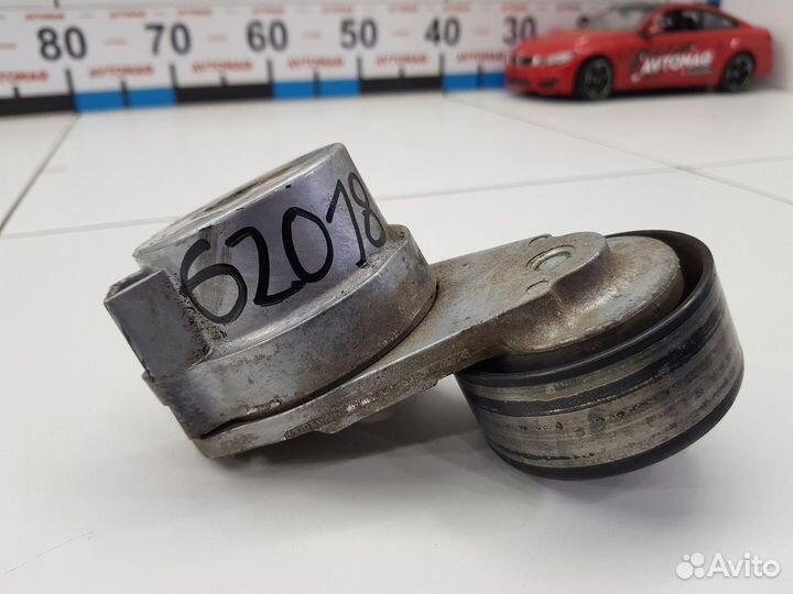 Натяжитель ремня (Opel Astra)