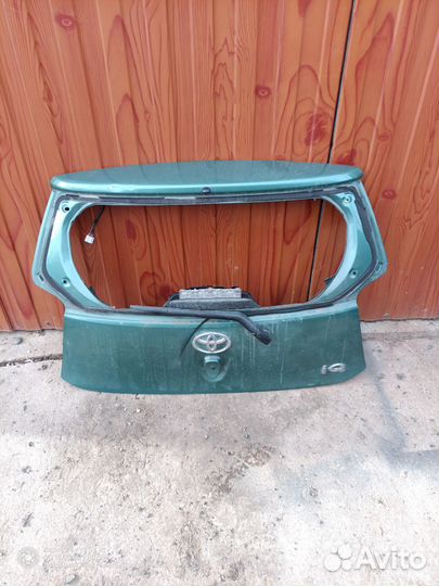 Дверь багажника тайота aq