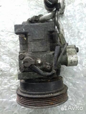 Компрессор кондиционера Mazda 323