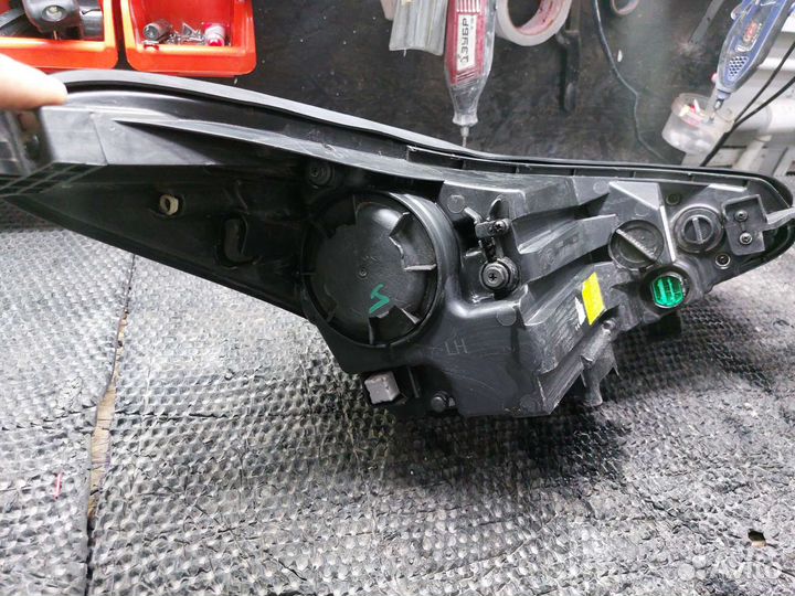 Фара левая Kia Sportage 4