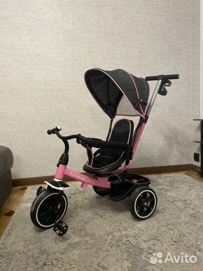 Трехколесный велосипед с ручкой